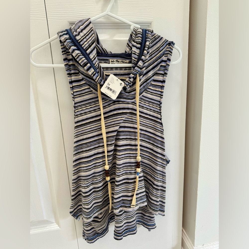 Free People, sleeveless hoodie.